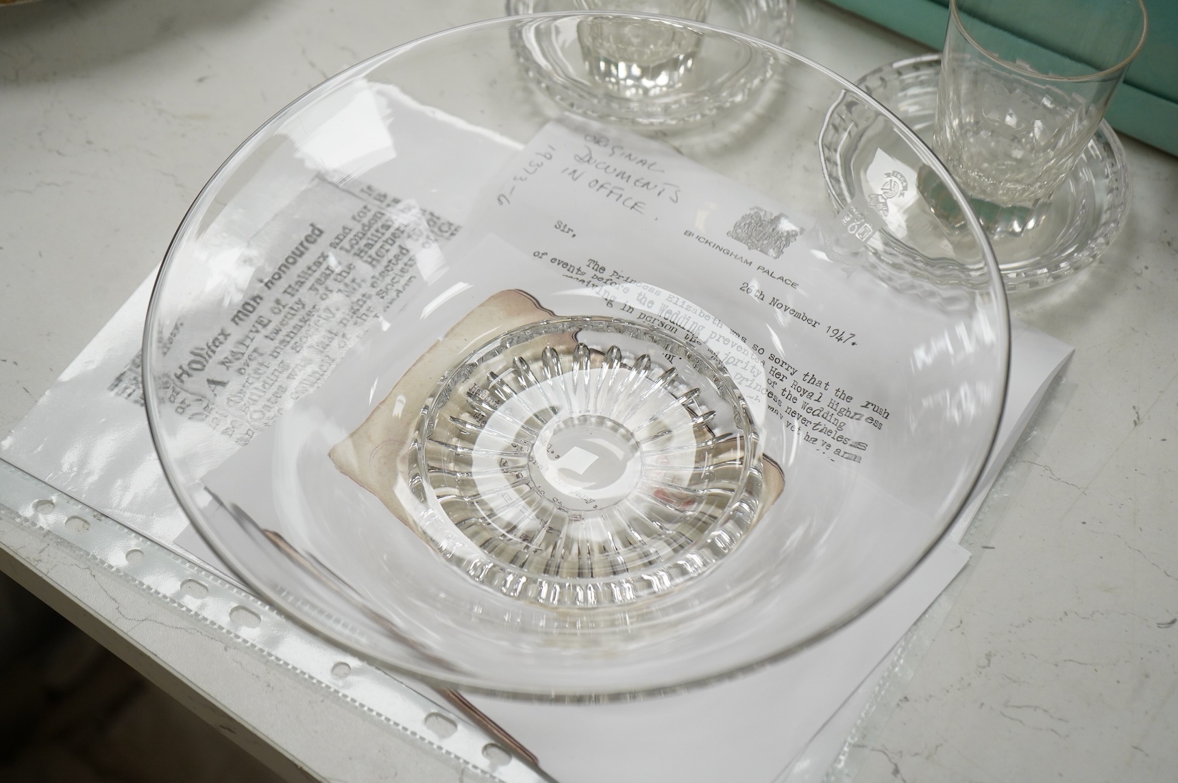 A collection of glass from the company of glass sellers. Including a replica of a gift given to Elizabeth II as a wedding gift, with a letter from the palace.